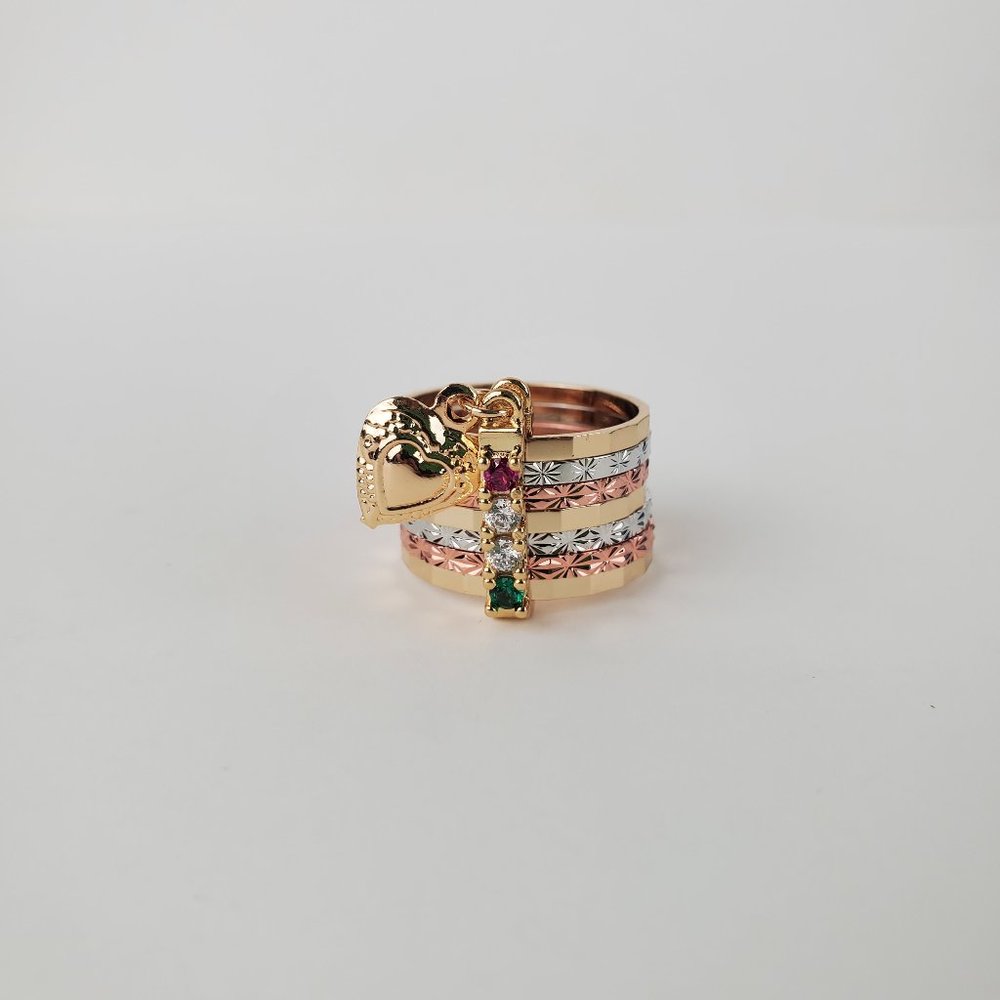 Ring for women new with tags , stainless steel , color gold , pink & green